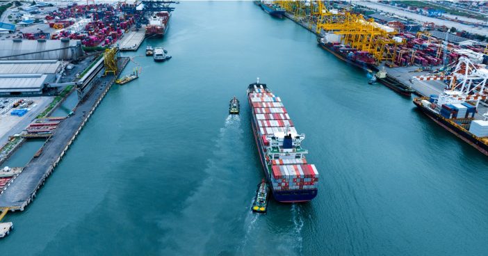 Shipyard cargo containers being transported